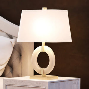 A unique bedside table with a gorgeous Urban Ambiance UEX7660 Contemporary Table Lamp 15''W x 9''D x 23''H, White and Brass Finish from the