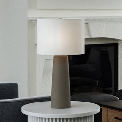 A beautiful and unique lighting fixture, the Urban Ambiance UEX7680 Modern-Rustic Table Lamp 15''W x 15''D x 27''H features a polished concrete finish