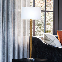 A unique lighting fixture, the UEX7700 Traditional Table Lamp, adds an elegant touch to a living room with its Gold Mercury Finish.