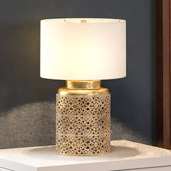 A unique Moroccan lighting fixture from the Lindsborg Collection by Urban Ambiance, featuring a white shade.