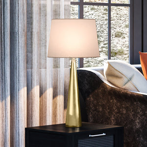 A gorgeous Mid-Century-Modern table lamp with an antique brass finish from the Lancaster Collection by Urban Ambiance.