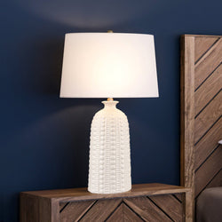 A beautiful bedside table with a unique Urban Ambiance UEX8090 Transitional Table Lamp.