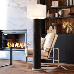 An elegantly designed living room with a luxury lighting fixture - an Urban Ambiance UEX8103 Scandinavian Floor Lamp 19''W x 19''D x 64''H, Blackened