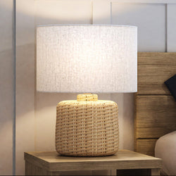 A UEX8150 Scandinavian Table Lamp 13''W x 13''D x 18''H, Natural Brown Finish, Lacey Collection on a bedside table - a gorgeous lighting fixture.