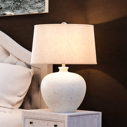 A beautiful bed with the Urban Ambiance UEX8180 Modern-Farmhouse Table Lamp 19''W x 19''D x 28''H, White Finish, Wylie Collection on