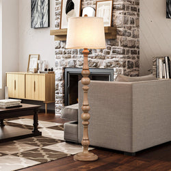 A beautiful living room with a UEX8190 Modern-Farmhouse Floor Lamp 18''W x 18''D x 63''H, Natural Brown Finish, Milpitas Collection from