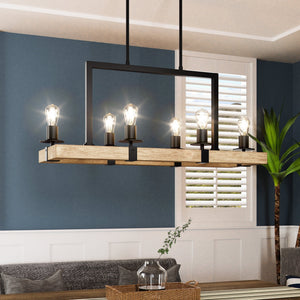 A dining room with blue walls decorated with a unique UFS2000 Modern Farmhouse Chandelier by Urban Ambiance.