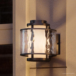A unique Urban Ambiance UHP1011 Nautical lighting fixture on the side of a building.