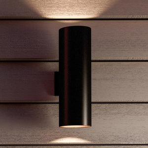 An UHP1067 Modern Outdoor Wall Light on a luxurious wooden wall.