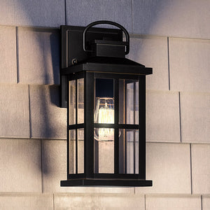 A gorgeous lighting fixture from the Anaheim Collection, the Urban Ambiance UHP1290 Transitional Outdoor Wall Sconce 12''H x 5''W in Olde Bronze Finish adds a touch
