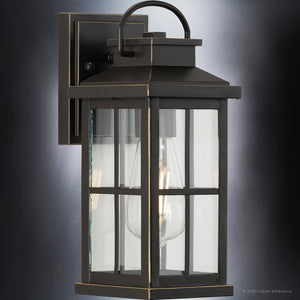 A unique and beautiful Urban Ambiance UHP1290 Transitional Outdoor Wall Sconce 12''H x 5''W, Olde Bronze Finish from the Anaheim Collection with a clear glass.
