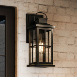 A unique UHP1292 Transitional Outdoor Wall Sconce 18''H x 7''W, Olde Bronze Finish, Anaheim Collection hanging on a brick wall by Urban Ambiance