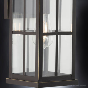 A gorgeous Urban Ambiance UHP1292 Transitional Outdoor Wall Sconce 18''H x 7''W in Olde Bronze Finish from the Anaheim Collection, featuring a glass shade
