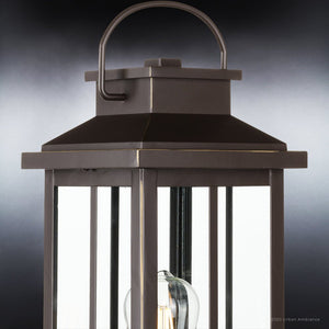A unique Urban Ambiance UHP1293 Transitional Outdoor Post Light with a clear glass bulb.