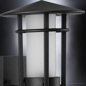 A gorgeous UHP1310 Mid-Century Modern outdoor wall sconce with a white glass.