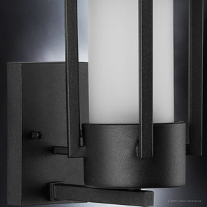 A beautiful UHP1310 Mid-Century Modern Outdoor Wall Sconce featuring a unique design, Midnight Black Finish, and white glass shade from the Riverside Collection brand.