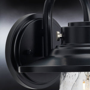 An Urban Ambiance UHP1320 Coastal Outdoor Wall Sconce 11''H x 9''W, Midnight Black Finish, Santa-Ana Collection that combines luxurious design with a beautiful clear
