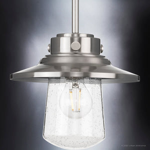 An Urban Ambiance UHP1324 Coastal Outdoor Pendant 8''H x 9''W, Stainless Steel Finish lamp with a clear glass shade.
