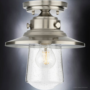 A unique Urban Ambiance UHP1325 Coastal Outdoor Ceiling Light 10''H x 9''W, Stainless Steel Finish, Santa-Ana Collection fixture with a clear glass bulb.