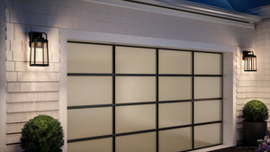 A luxury garage door with a beautiful UHP1340 Transitional Outdoor Wall Sconce 14''H x 7.125''W, Olde Bronze Finish, Orlando Collection by Urban Ambiance