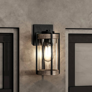 A beautiful UHP1350 Farmhouse Outdoor Wall Sconce 13''H x 6.375''W lighting fixture with a glass shade.