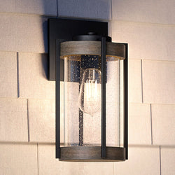 A luxurious UHP1351 Farmhouse Outdoor Wall Sconce with a gorgeous glass shade.