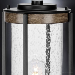 An Urban Ambiance UHP1353 Farmhouse Outdoor Post Light, a gorgeous lighting fixture with a glass shade.