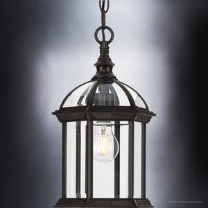 A gorgeous Urban Ambiance UHP1373 Transitional Outdoor Pendant 13.625''H x 7.5''W, Olde Bronze Finish, Greensboro Collection light fixture with a
