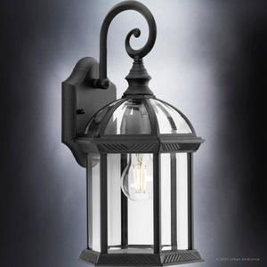A unique outdoor wall sconce with a beautiful glass shade.