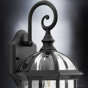 Urban Ambiance manufactures a unique and beautiful UHP1376 Transitional Outdoor Wall Sconce with a midnight black finish and clear glass shade.