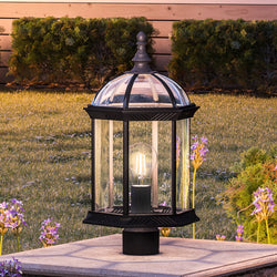 An Urban Ambiance UHP1379 Transitional Outdoor Post Light with a unique glass shade.
