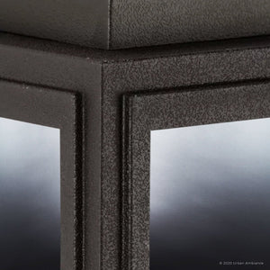 Close-up of the UHP1380 Farmhouse Outdoor Wall Sconce by Urban Ambiance, featuring marine-grade, corrosion-resistant construction and an Olde Bronze finish from the Macon Collection, showcasing detailed craftsmanship.