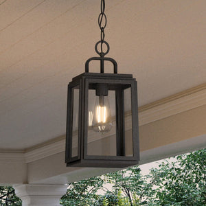 An Urban Ambiance UHP1383 Farmhouse Outdoor Pendant, a beautiful and luxury Olde Bronze Finish, Macon Collection hanging from a porch.