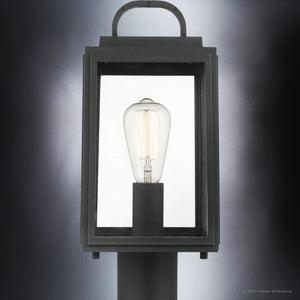 The Urban Ambiance UHP1384 Macon Collection Farmhouse Outdoor Post Light features marine-grade, corrosion-resistant construction in an Olde Bronze finish with clear glass panels, displaying an exposed vintage-style bulb.