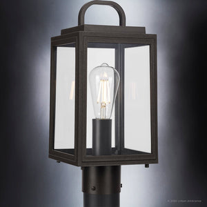 A close-up of the UHP1384 Farmhouse Outdoor Post Light by Urban Ambiance, featuring an Olde Bronze finish, marine-grade construction, and clear glass panels from the Macon Collection.