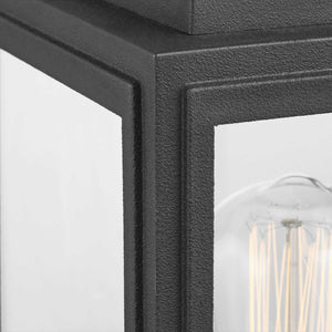 Close-up of the Urban Ambiance UHP1385 Farmhouse Outdoor Wall Sconce from the Macon Collection, 11.875''H x 5.5''W, with a midnight black finish and marine-grade construction—coastal-inspired outdoor lighting.