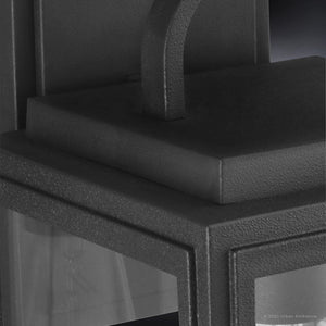 Close-up of the Urban Ambiance UHP1385 Macon Collection farmhouse outdoor wall sconce, 11.875''H x 5.5''W, in midnight black with marine-grade construction and a textured finish.