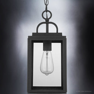 The UHP1388 Farmhouse Outdoor Pendant by Urban Ambiance features a rectangular frame in midnight black, measures 15.375''H x 7''W, and offers marine-grade construction as part of the Macon Collection for stylish coastal appeal.