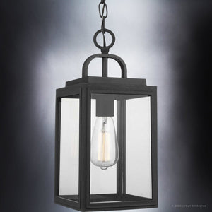 The Urban Ambiance UHP1388 Farmhouse Outdoor Pendant from the Macon Collection features a visible bulb, sturdy chain, and marine-grade midnight black finish for coastal style and lasting outdoor durability. Size: 15.375''H x 7''W.