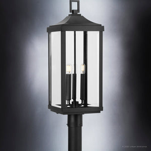 A beautiful farmhouse outdoor post lamp from the Calderdale Collection by Urban Ambiance, featuring a midnight black finish and three lights.
