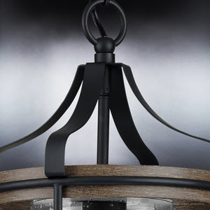 A gorgeous UHP1420 Farmhouse Outdoor Pendant light with a glass shade.