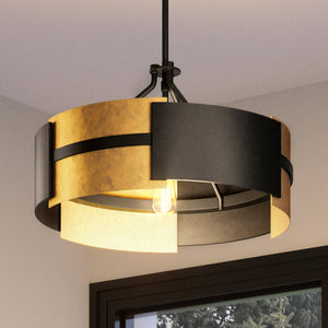 A unique and gorgeous lighting fixture, the Urban Ambiance pendant light from the Gambier Collection hangs over a window.