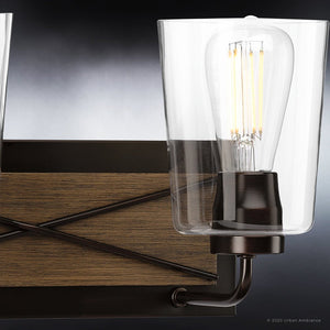 A Gorgeous Farmhouse Bath Lighting Fixture from the Berkeley Collection with three glass bulbs.