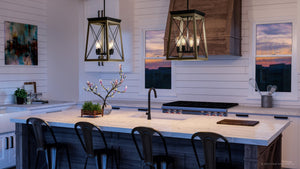 A kitchen with a beautiful UHP3906 Industrial Chandelier 20.125''H x 15.5''W, Olde Bronze Finish, Berkeley Collection from Urban Ambiance and bar stools