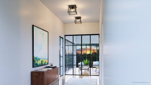 A hallway with glass doors and a gorgeous UHP3908 Industrial Ceiling Light 7.625''H x 9.5''W, Olde Bronze Finish, Berkeley Collection by Urban Ambiance