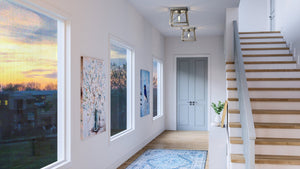 An image of a hallway with stairs and a rug featuring the beautiful UHP3916 Industrial Ceiling Light 7.625''H x 9.5''W, Galvanized Steel Finish