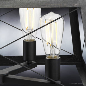 Two UHP3919 Industrial Chandelier 12''H x 20''W, Midnight Black Finish, Berkeley Collection light bulbs by Urban Ambiance on a beautiful black table.