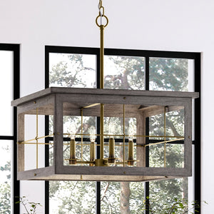 An Urban Ambiance UHP3955 Modern Farmhouse Chandelier 12.75''H x 21.375''W, Distressed Brass Finish, Ballina Collection hanging over a window in