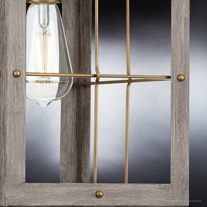 A beautiful Urban Ambiance UHP3956 Modern Farmhouse Pendant in a distressed brass finish from the luxurious Ballina Collection, featuring a wooden frame and glass bulb.