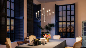 A dining room with a unique UHP3970 Modern Farmhouse Chandelier 27''H x 28''W, Brushed Nickel Finish, Armidale Collection from Urban Ambiance in front